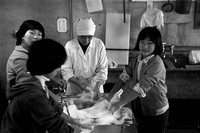 Girls helping in the kitchen