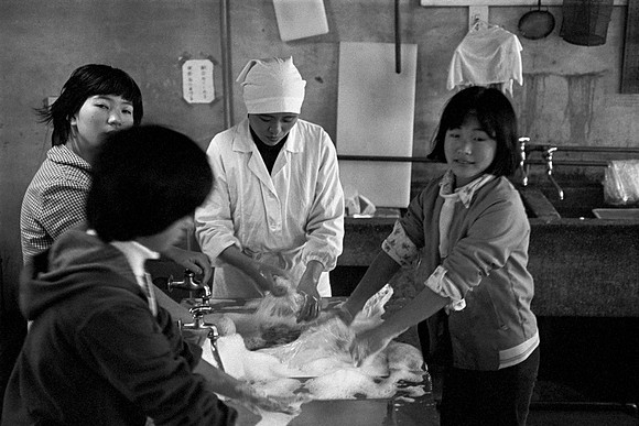 Girls helping in the kitchen