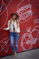 Girl on Red Wall